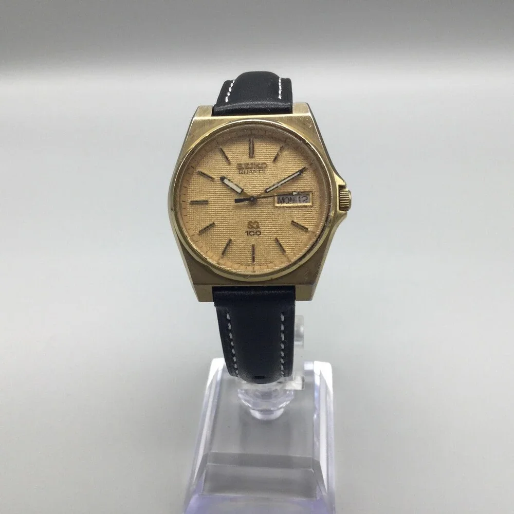 Vintage Seiko SQ 100 Mens Watch 33mm Gold Tone Day Date 6923-8010 New Battery